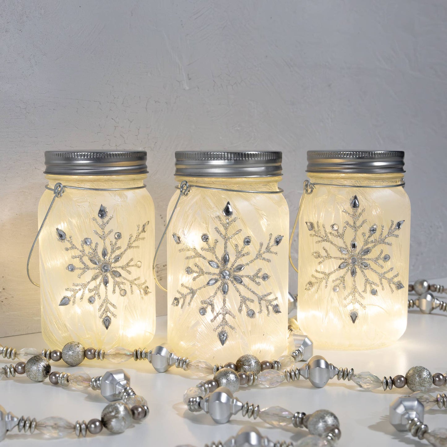 LumaBase - Battery-Operated Silver Snowflake Glass Mason Jar